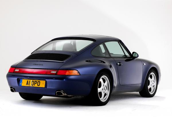 1993 dark blue Porsche 993, seen from behind